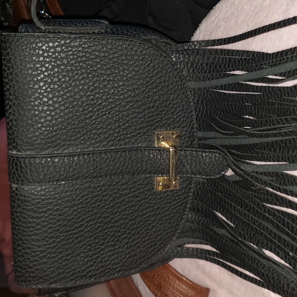 Metaphor | Leather look fringe